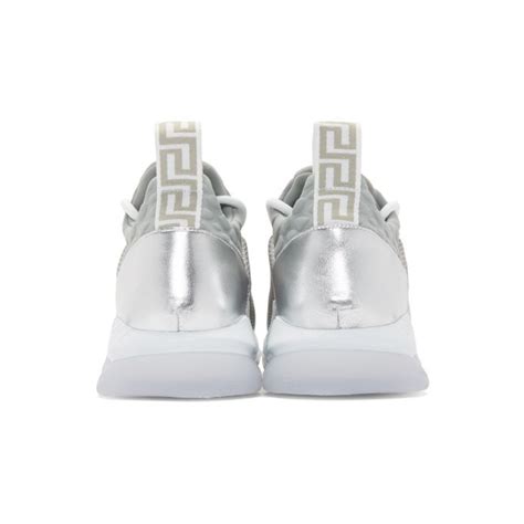 Versace: Silver Glitter Cross Chainer Sneakers 